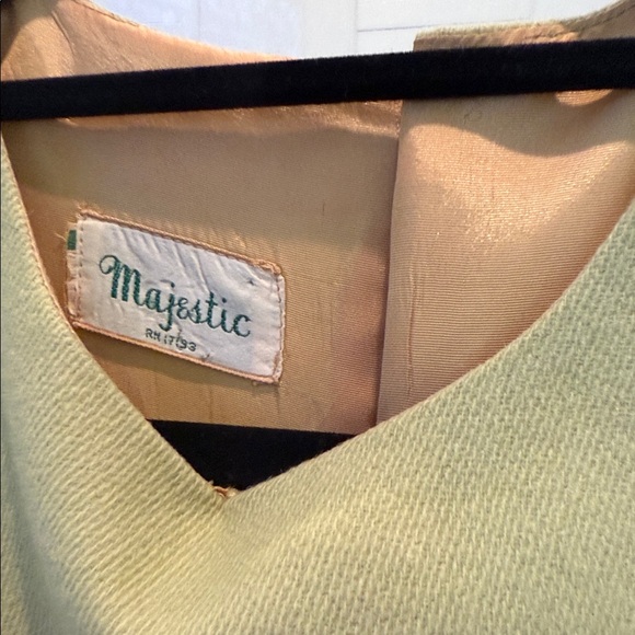 Majestic Sleeveless Green Dress with Pleated Skirt - Picture 7 of 8